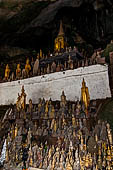 Luang Prabang, Laos - The Pak Ou Caves, the lower cave called Tham Ting. The caves, a Buddhist pilgrimage site, are a repository of old Buddha statues. 